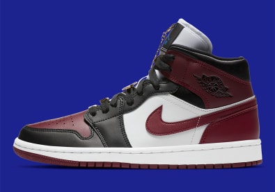 Jordan voegt een dosis goud toe aan deze nieuwe Jordan 1 Mid "Maroon"