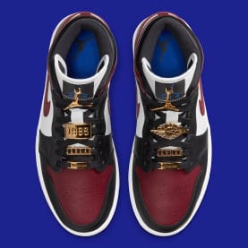 Jordan voegt een dosis goud toe aan deze nieuwe Jordan 1 Mid "Maroon"