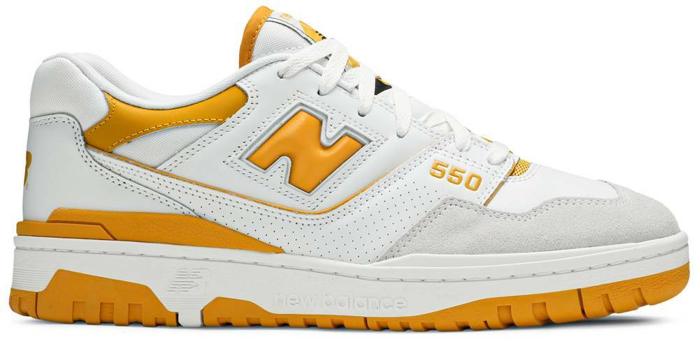 white new balance with gold